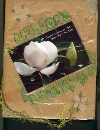 Cover of tree-sit journal with magnolia blossom
