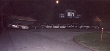 Nine police cars at Coven Oldenwilde's Samhain 97 free public Witch ritual at Asheville's Memorial Stadium