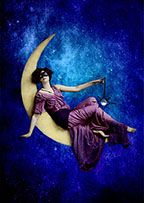 Masked Goddess reclining on crescent Moon