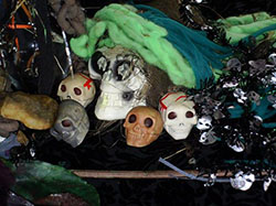 Detail of skulls on Earth altar.