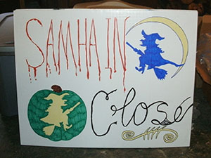 Samhain Close sign by Lady Passion of Wiccan Coven Oldenwilde at Asheville's Free Public Witch Ritual