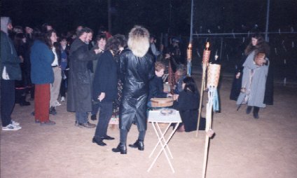 Getting a fortune told in a free divination at Coven Oldenwilde's Samhain 97 free public Witch ritual at Asheville's Memorial Stadium