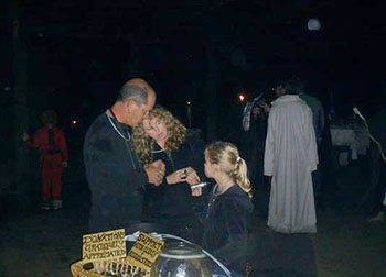 Family by donations sign.