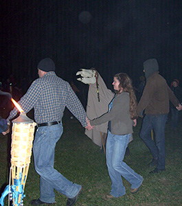 Spiral dancers (and an orb) by the Mast Beast at Asheville's Free Public Witch Ritual